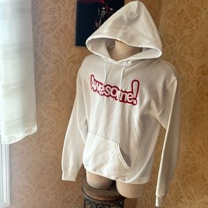 White pullover hoodie says awesome front pocket on hoodie as well (unisex)